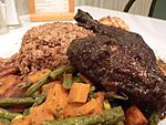 Jerk chicken with rice and plantains