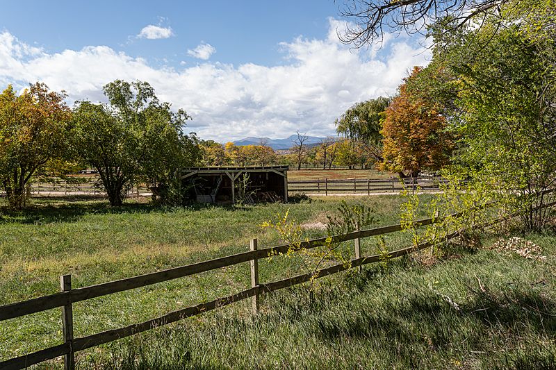 Image Looking out over the pasture at Los Luceros ranch complex near