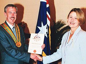 Mayor John Fowler presents Citizenship to future NSW Premier Kristina Keneally