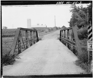 OBLIQUE VIEW OF BRIDGE, LOOKING SOUTHWEST - Branch River Bridge, Spanning Branch River, on Hillcrest Road, Kellnersville, Manitowoc County, WI HAER WIS,36-FRANK,1-2