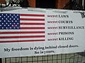 Secret Laws,placard in front of Ecuador embassy