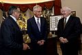 Secretary of Defense Chuck Hagel, center, speaks with former Secretary of Defense Robert Gates, right, and former Secretary of Defense Leon Panetta at the Peace Through Strength Forum and Awards dinner at 131116-D-BW835-1440