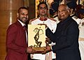 Shri Ram Nath Kovind presenting the Arjuna Award, 2021 to Shri Shikhar Dhawan