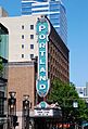 Sunlit view of "Portland" sign on Schnitzer Concert Hall in 2009