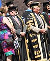 The Chancellor and Vice-Chancellor of Brunel stand ready with some graduates (7637454146) (cropped)