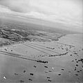 The Mulberry artificial harbour off Arromanches in Normandy, September 1944. BU1024