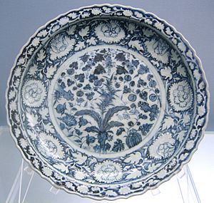 Foliated dish with underglaze blue design of melons, bamboo and grapes, Jingdezhen ware, Yuan, 1271-1368, Shanghai Museum