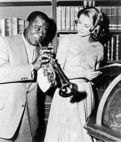 Louis Armstrong and Grace Kelly on the set of "High Society", 1956