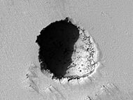 Pavonis Mons eastern flank lava tube skylight crop sharp