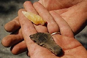 Quartz projectile point and pottery shard found by Dr. Eugene Boeschat Jay Estate