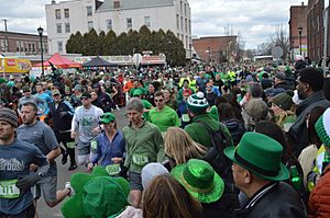 Runners leave the starting line at the 44th annual Holyoke St Patrick's Road Race (2019)