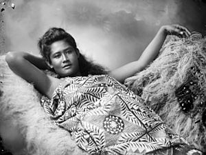 Samoan girl, wearing an elaborate Lavalava, draped in a Siapo (barkcloth)