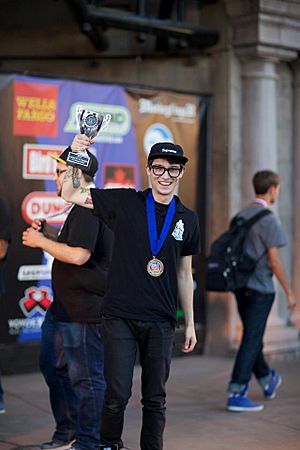 Tyler Severance holding 5A National Trophy