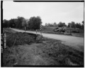 3-4 VIEW, LOOKING NORTH, SHOWING BRIDGE PARAPETS AND RECENT INFILLING BY BULLDOZER (SCALE ROD IS MEASURED IN FEET) - Jenny Lind Bridge, Spanning Vache Grasse Creek tributary at HAER ARK,66-JELI.V,1-2