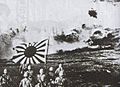 Japanese naval landing forces blasting Chinese pillbox and marching with the naval flag, Canton Operation