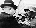 Jozef Tiso decorates German soldiers