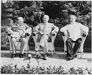 L to R, British Prime Minister Winston Churchill, President Harry S. Truman, and Soviet leader Josef Stalin in the... - NARA - 198958