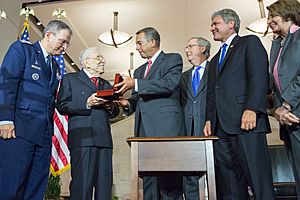 Leaders of the U.S. House and Senate present a Congressional Gold Medal in honor of the members of the Civil Air Patrol of World War II