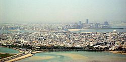View of  Muharraq with the skyline of Manama in the background
