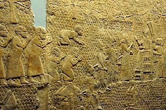 Relief depicting Sennacherib at Lachish, interacting with officials and reviewing prisoners