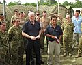 Then Foreign Minister Kevin Rudd with AusAID's Thanh Le and elements of the Australian Army medical team August 2010