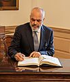 Albanian Prime Minister Edi Rama signs the guest book, at the Department of State in Washington, D.C. (February 5, 2020 - cropped)
