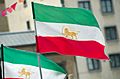 Iranian flags with sun and lion