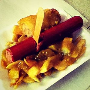 Saveloy, chips and curry