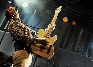 Steve Diggle of Buzzcocks onstage 2011