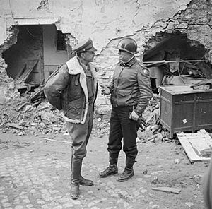 The commander of the Allied Armies in Italy, General Sir Harold Alexander, with American General Truscott, in charge of the Allied bridgehead at Anzio, 4 March 1944. NA12364