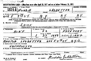 "HUDDIE LEDBETTER" "REGISTRATION CARD" "SERIAL NUMBER U2214" "604 E 9TH ST., N.Y. N. Y." "DATE OF BIRTH 1-23-1889" "PLACE OF BIRTH FREEPORT LOUISIANA" and "MARTHA LEDBETTER", from- Lead Belly draft registration card, ca. 1942 (cropped)