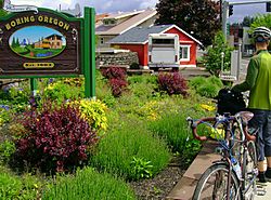 Cyclists at the west entrance to Boring on Oregon Route 212