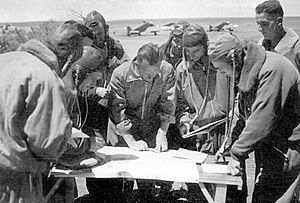 Italian pilots studying a map in Egypt (Sept 1940)
