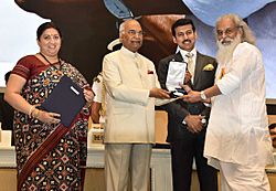 Ram Nath Kovind presenting the Rajat Kamal Award to Padma Vibhushan Dr. K.J. Yesudas (Best Male Playback Singer) for the film VISWASAPOORVAM MANSOOR (Malayalam), at the 65th National Film Awards Function, in New Delhi