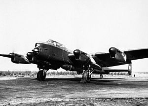 Avro Lancaster B Mk I (Special) of No. 617 Squadron, loaded with a 'Grand Slam' 22,000-lb deep-penetration bomb, running up its engines at Woodhall Spa, Lincolnshire, 1944. MH4263