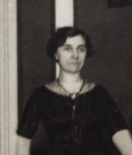 A black and white, informal photograph of a woman