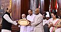 The President, Shri Ram Nath Kovind presenting the Outstanding Parliamentarian Award for the year 2016 to Shri Dinesh Trivedi, at a function, at Parliament House, in New Delhi