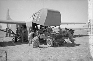 Jeep being loaded into waco glider