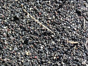 Volcanic sand (Perissa, Santorini, Greece)