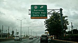 Sign for Barrazas, Trujillo Bajo and Santa Cruz, barrios in Carolina