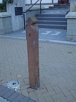 View of an old wooden post