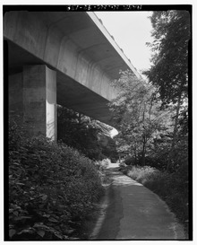 Linn Cove Viaduct. View of the Tanawha trail and underneath of the viaduct. Shape of the piers was designed to provide aesthetic sense of light and shadow. Looking north HAER NC,11-ASHV.V,2-138