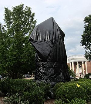Robert Edward Lee sculpture covered in tarp