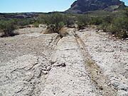 Superior-Pinal City-Wagon Wheel Tracks in stone-1897-2