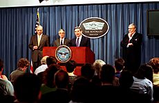 White, Gordon, Wolfowitz, and Roche at a press conference, June 2001