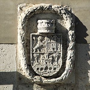 Escudo bajo la Virgen de la Guía