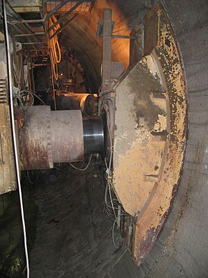 Hydraulic jacks holding a TBM in place