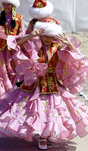 Kazakh girls wear traditional Kazakh costumes