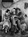 King Vidor (Center) with Renée Adorée (L) and John Gilbert. On the set of The Big Parade (1925 film), M-G-M studios
