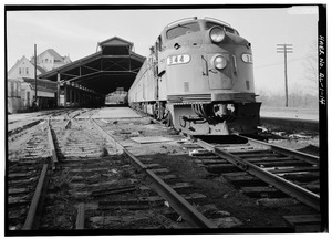 VIEW LOOKING WEST, SHOWING LOCOMOTIVE AND TRAINSHED - Louisville and Nashville Railroad, Union Station Train Shed, Water Street, opposite Lee Street, Montgomery, Montgomery County, AL HAER ALA,51-MONG,23A-14